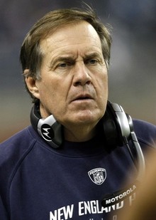 New England Patriots head coach Bill Belichick coaches from the side line during the second half of their Thanksgiving Day NFL football game against the Detroit Lions in Detroit